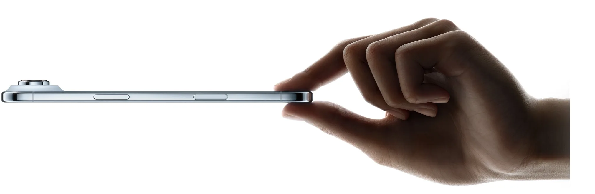 iPhone Air held edge-on between two fingers
